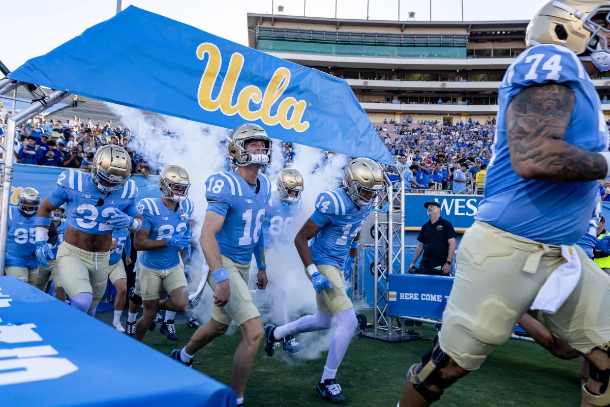 Players on the UCLA Bruins football team take the field prior to a football game against the Maryland Terrapins at the Rose Bowl in Pasadena on Oct. 18, 2025. Photo by Greg Fiore, Icon Sportswire via Getty Images
