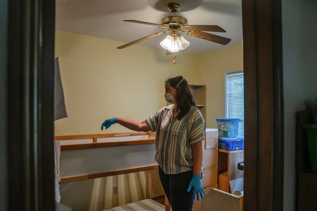 Gil Barel in her son’s room in Pasadena on Aug. 2, 2026. Barel and her family are still waiting for their home, a duplex they had rented for eight years before the January 2025 Eaton Fire, to be cleaned up and free of toxic materials before they move back in. Photo by Ariana Drehsler for CalMatters