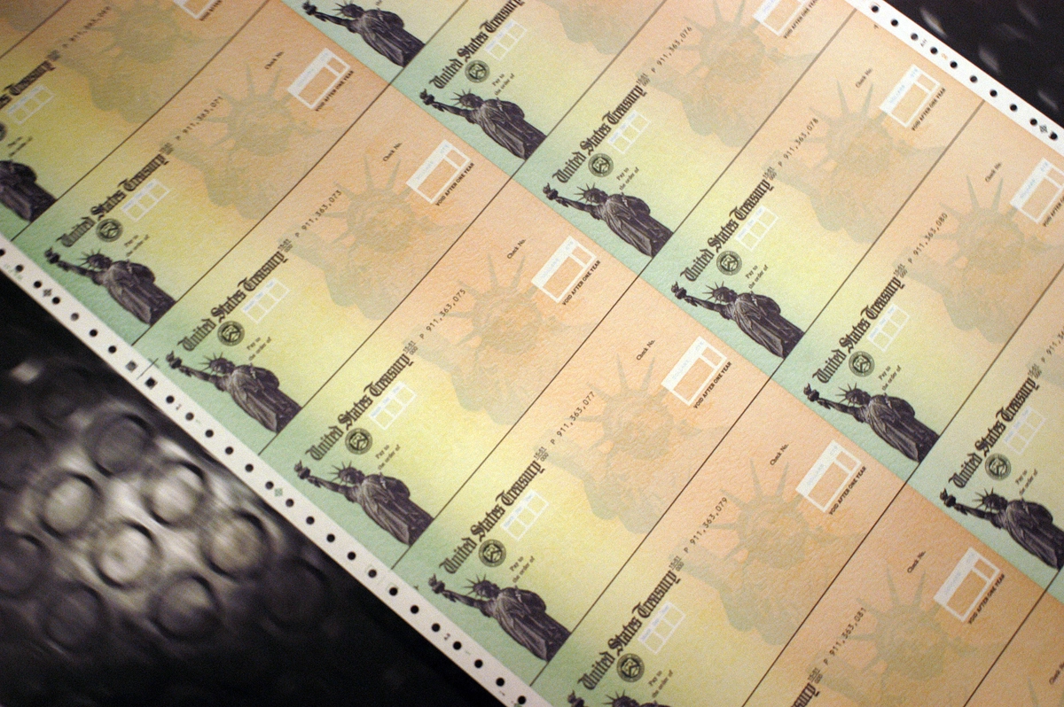 Blank Social Security checks are run through a printer at the U.S. Treasury printing facility in Philadelphia, Penn., on Feb. 11, 2005. William Thomas Cain /Getty Images